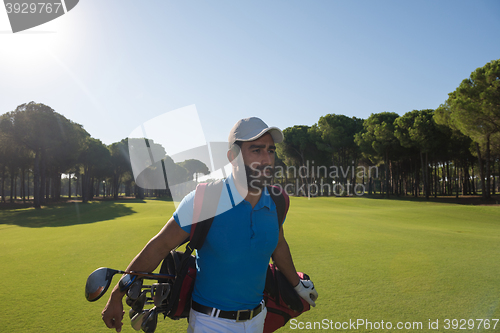 Image of golf player walking
