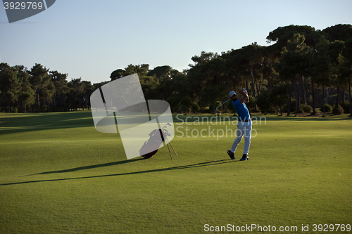 Image of golfer hitting long shot