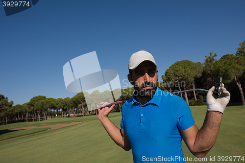 Image of golf player portrait at course