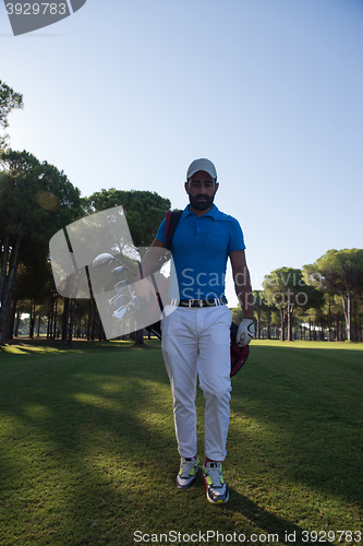 Image of golf player walking