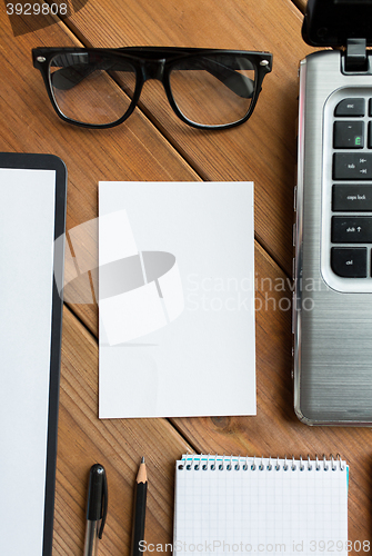 Image of close up of blank paper and office supplies