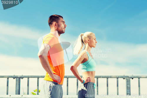 Image of sporty couple outdoors