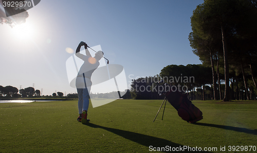 Image of golf player hitting shot