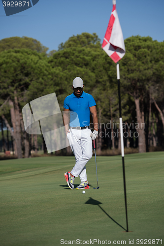 Image of golf player portrait at course