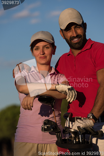 Image of portrait of couple on golf course