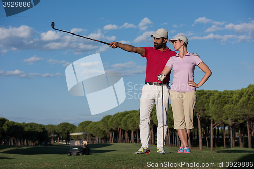 Image of portrait of couple on golf course