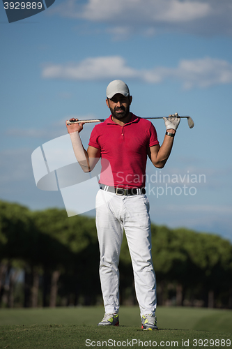 Image of handsome middle eastern golf player portrait at course