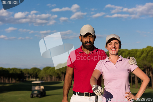 Image of portrait of couple on golf course