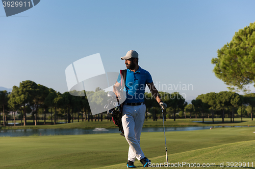 Image of golfer  portrait at golf  course