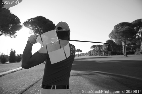 Image of golf player hitting shot