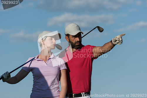 Image of portrait of couple on golf course