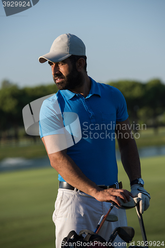 Image of golfer  portrait at golf course