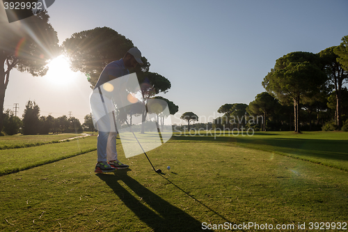 Image of golf player hitting shot