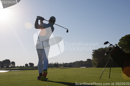 Image of golf player hitting shot