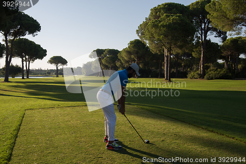 Image of golf player hitting shot