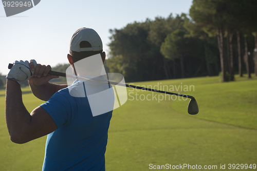 Image of golf player hitting shot