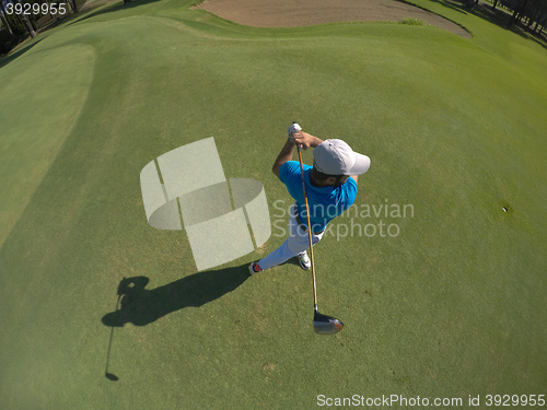 Image of top view of golf player hitting shot