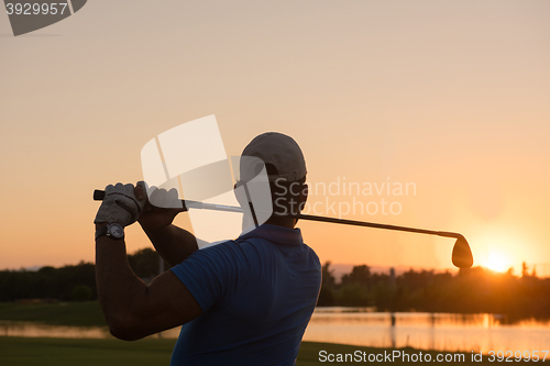 Image of golfer hitting long shot