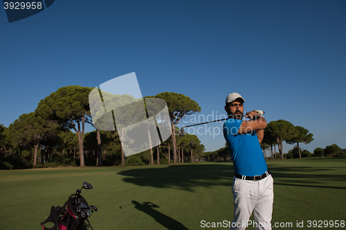 Image of golf player hitting shot