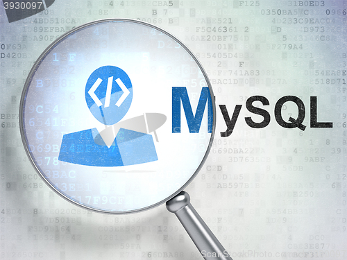 Image of Programming concept: Programmer and MySQL with optical glass