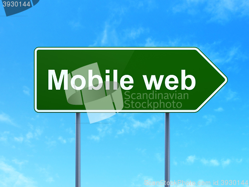 Image of Web development concept: Mobile Web on road sign background
