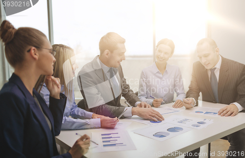 Image of smiling business team at meeting