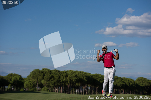 Image of golf player hitting long shot