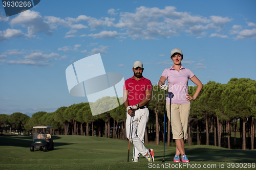 Image of portrait of couple on golf course