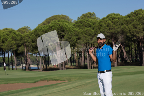 Image of golf player portrait at course