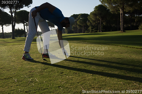 Image of golf player hitting shot