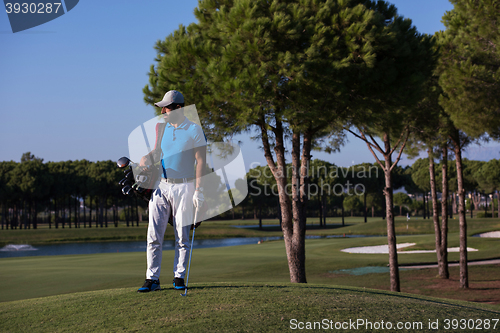 Image of golf player portrait at course