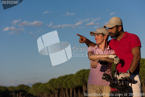 Image of portrait of couple on golf course