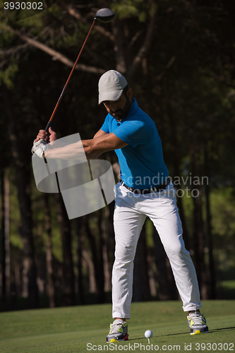 Image of golf player hitting shot