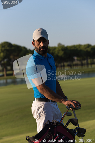 Image of golfer  portrait at golf course