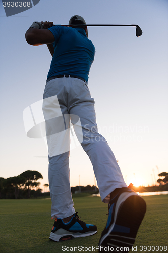 Image of golfer hitting long shot