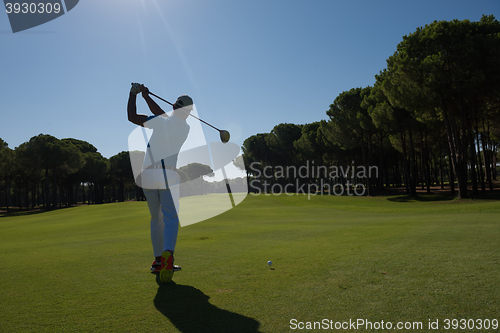 Image of golf player hitting shot