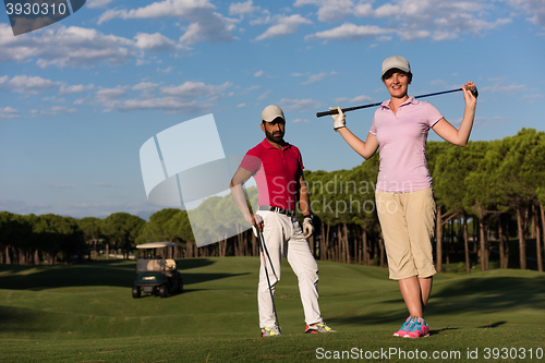 Image of portrait of couple on golf course