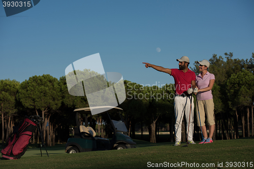 Image of portrait of couple on golf course