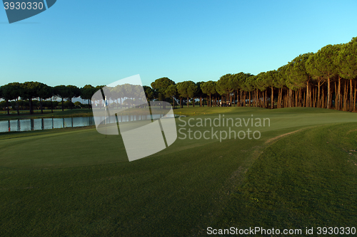 Image of golf course on sunset