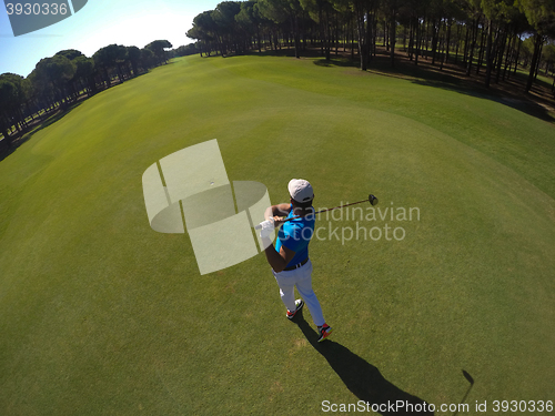 Image of top view of golf player hitting shot