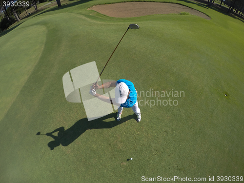 Image of top view of golf player hitting shot