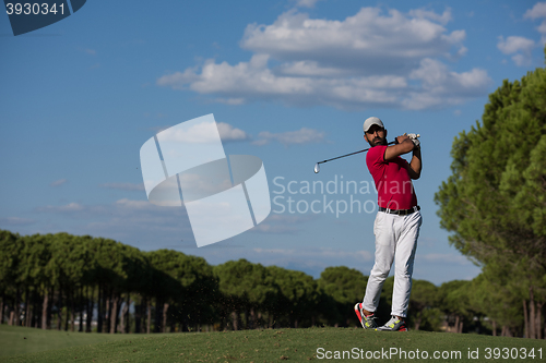 Image of golf player hitting long shot