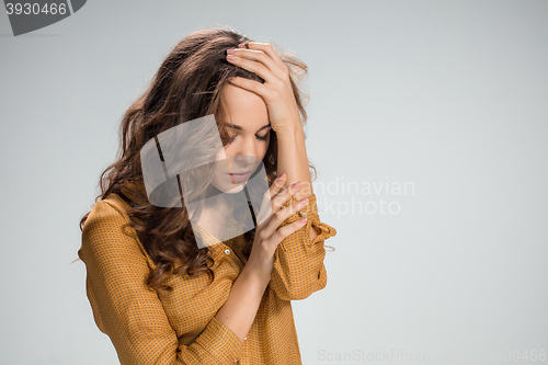 Image of The young woman\'s portrait with sad emotions