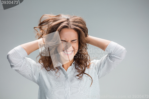 Image of The young woman\'s portrait with pain emotions