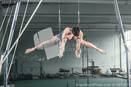 Image of Gymnast on Stationary Rings