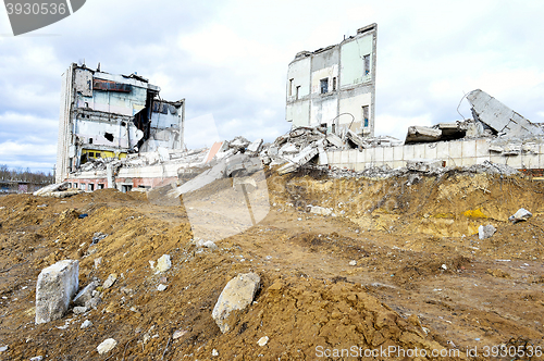 Image of Pieces of Metal and Stone are Crumbling from Demolished Building