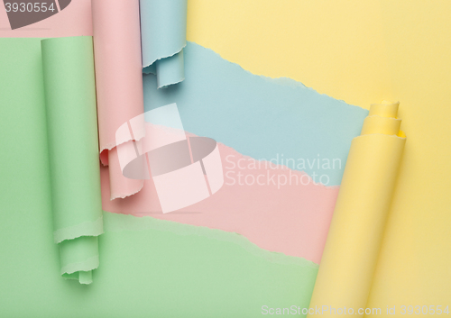 Image of Abstract torn colored paper background