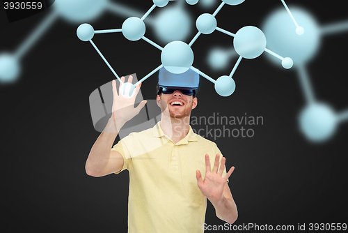 Image of happy man in virtual reality headset or 3d glasses