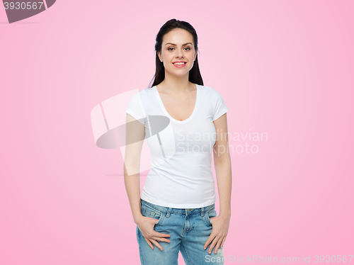 Image of happy young woman or teenage girl in white t-shirt