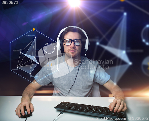 Image of man in headset with computer virtual projections